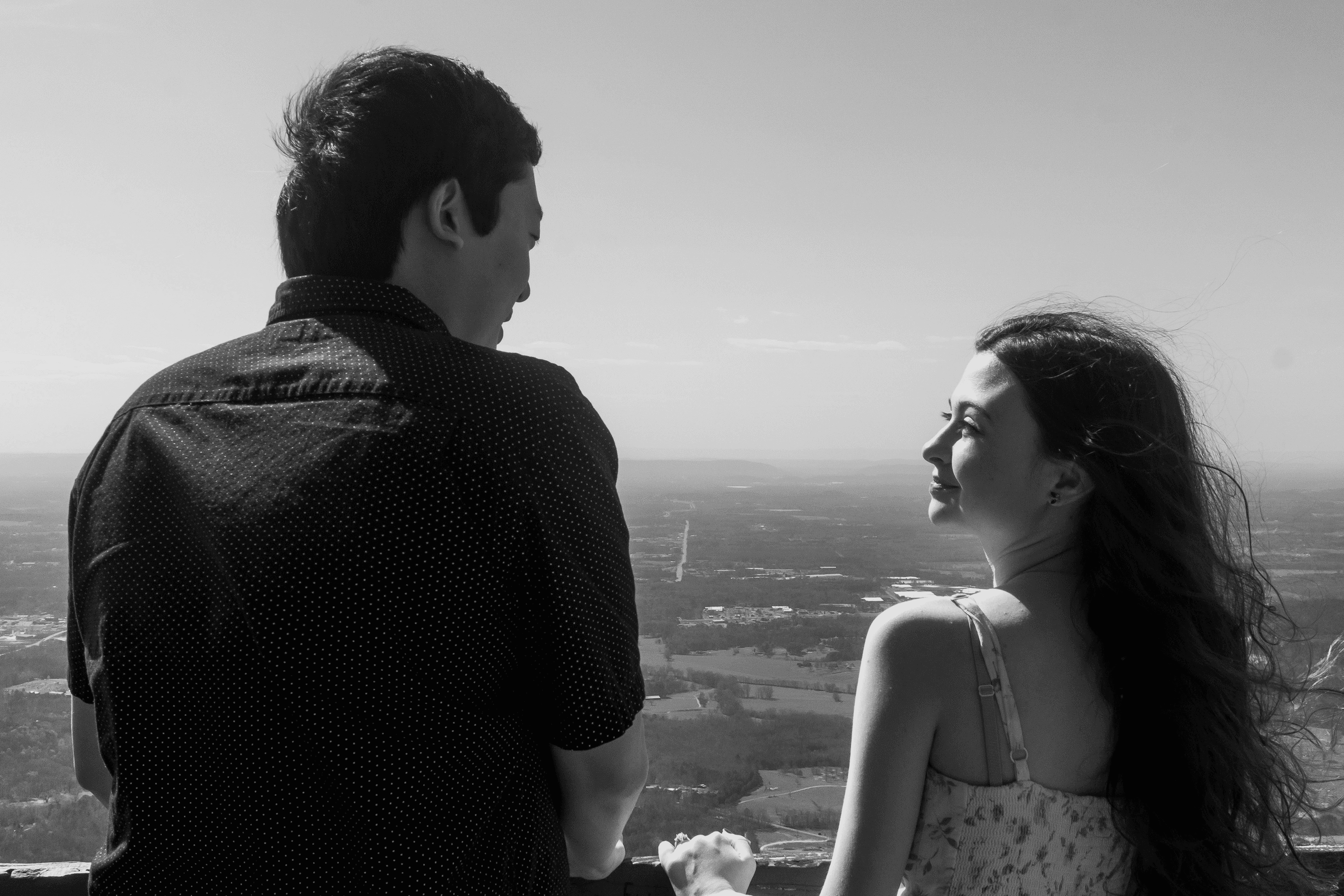 Black and white image Lillian and Max overlooking large scenery